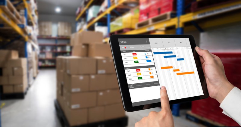 a tablet labor tracking inside warehouse