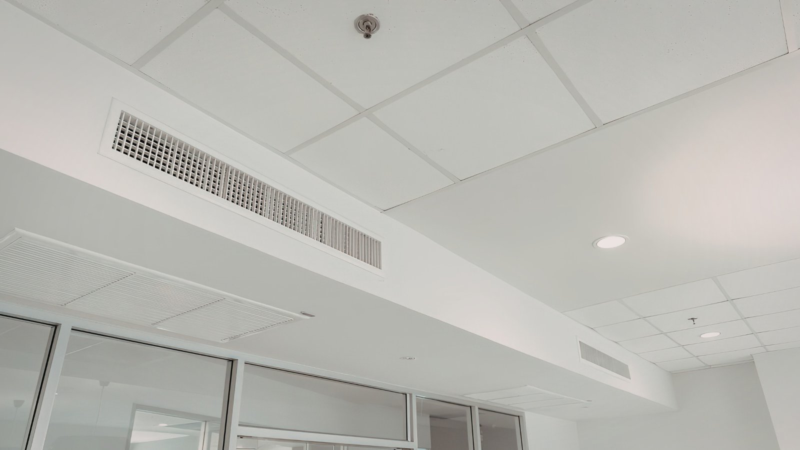 Compact air vent providing modern HVAC within limited historic interior space