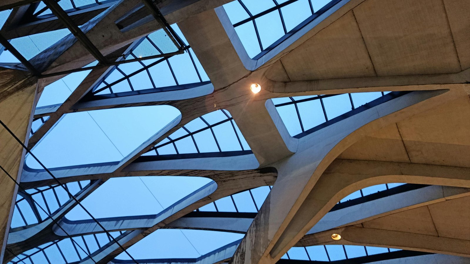 Architectural ceiling with integrated lighting and ventilation preserving the design vision
