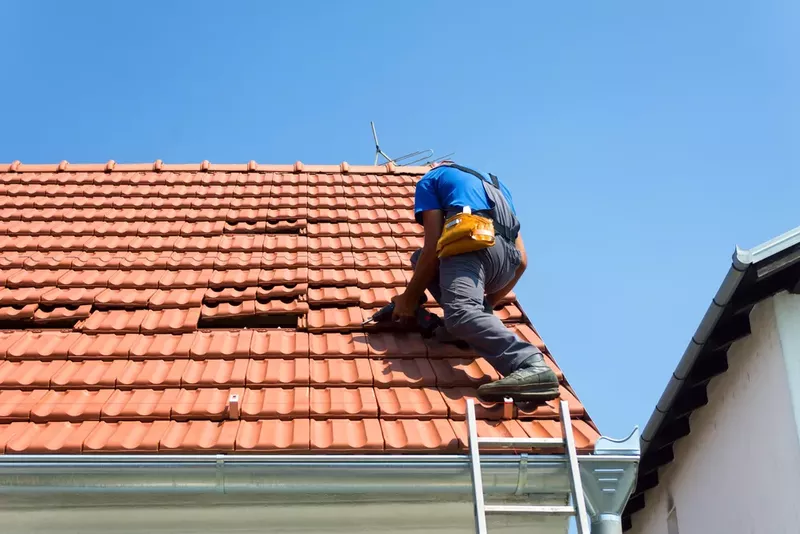 Residential roofers completing roof replacement in Downers Grove, IL