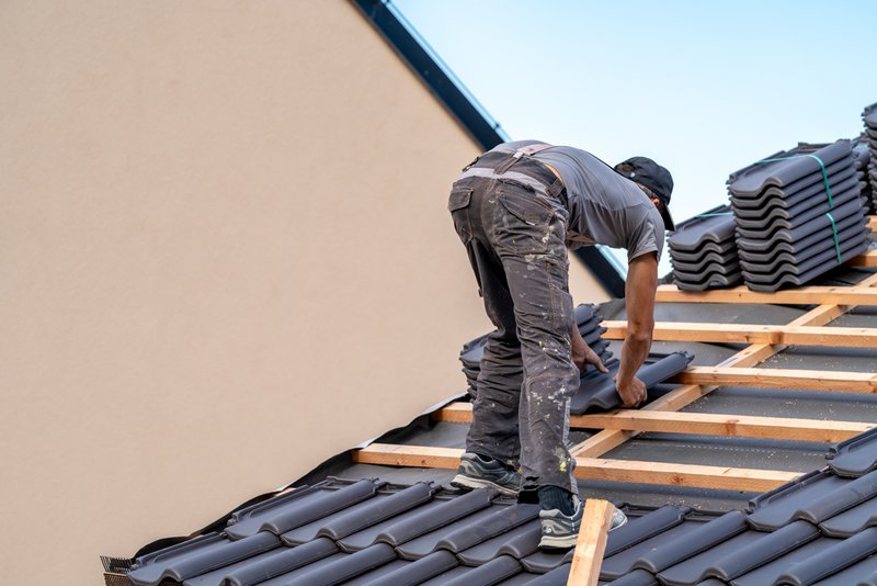 contractor working as part of roofing companies plymouth