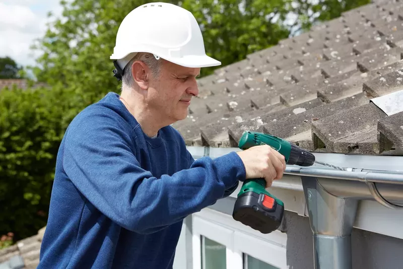 Spring-time gutter replacement improving drainage after winter weather