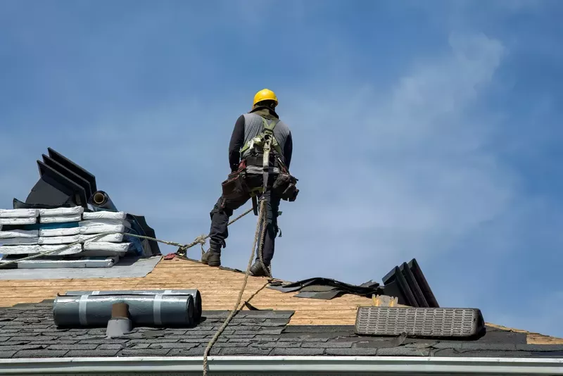 Storm-damaged roof repair addressing leaks and structural damage
