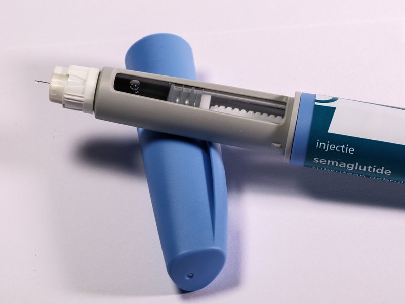 This photo features a GLP 1 injection