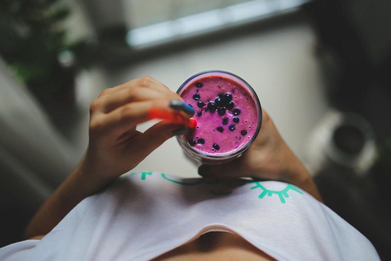 This photo shows a beverage that contains superfood powder
