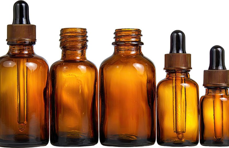 amber glass bottles different sizes lined up