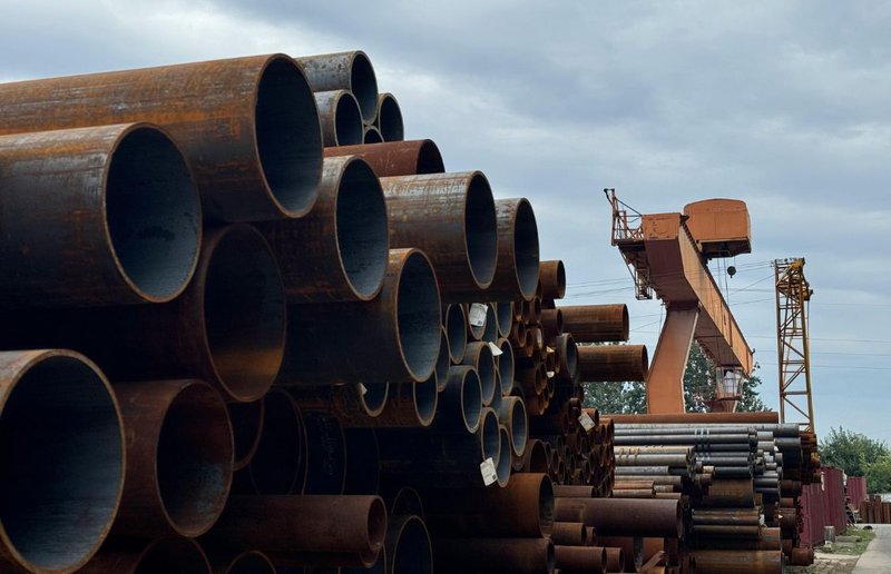  carbon steel tubing stacked at an outdoor manufacturing yard