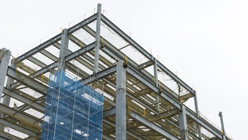 The Sustainability Benefits of Using Hollow Structural Steel in Green Building 1 A multi-story building framework under construction with sustainable Hollow Structural Steel.