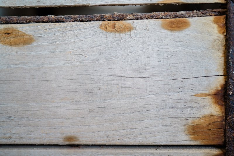 Weathering is inevitable, whether you use natural wood or composite siding materials.