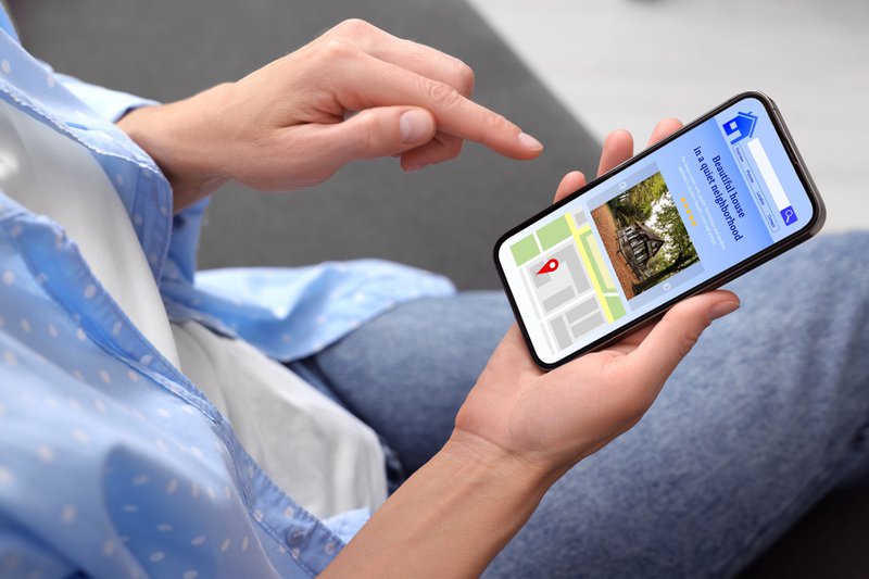 A close-up of resident accessing self-service property management features on a mobile app
