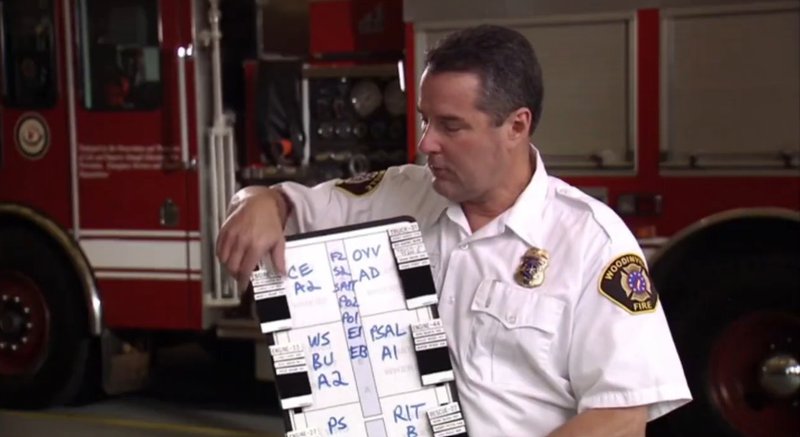 A fire officer presenting a sample incident command.