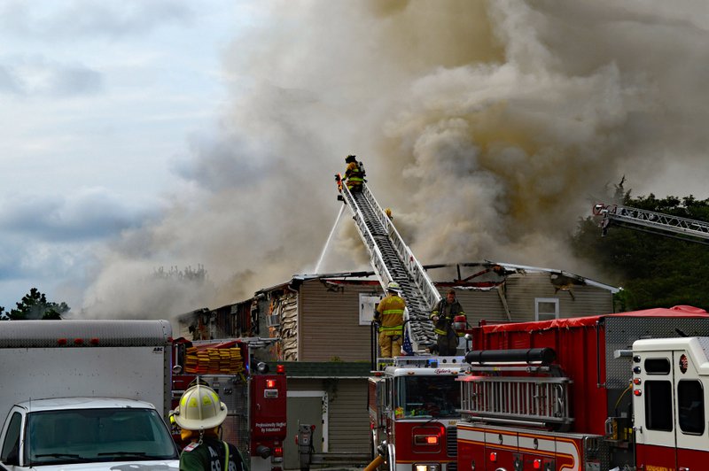 A firefighting team working with full fireground accountability.