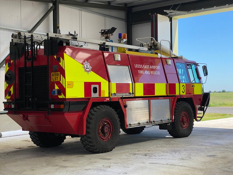 A fire truck for an airport fire department, which uses a passport accountability system.