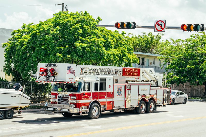 A firetrack responding, with accountability systems ensuring timely updates of its location and activity.