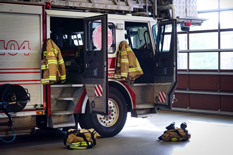 A parked firetruck with PPE, among the necessary equipment provided by federal grant programs.