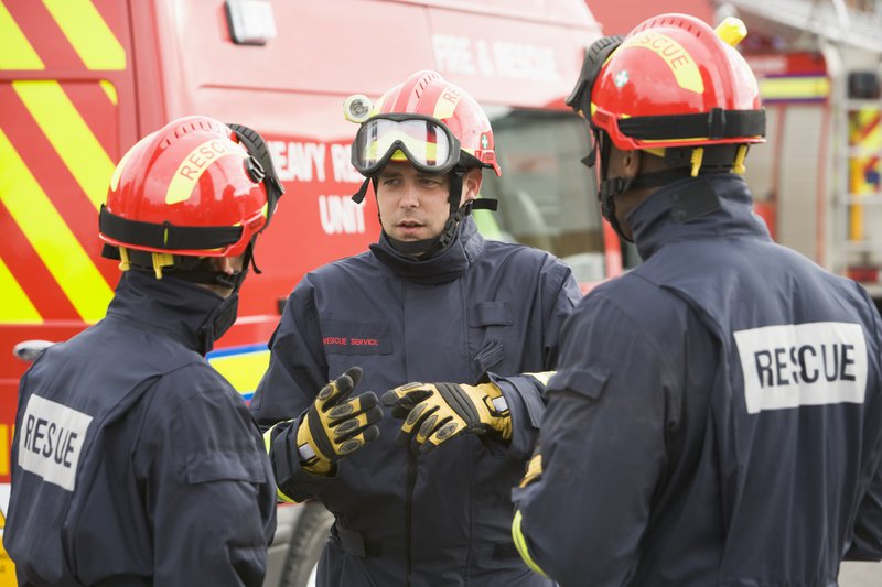 Working fire responders having a discussion.