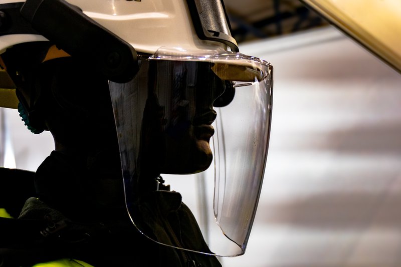 An emergency responder helmet shield on display