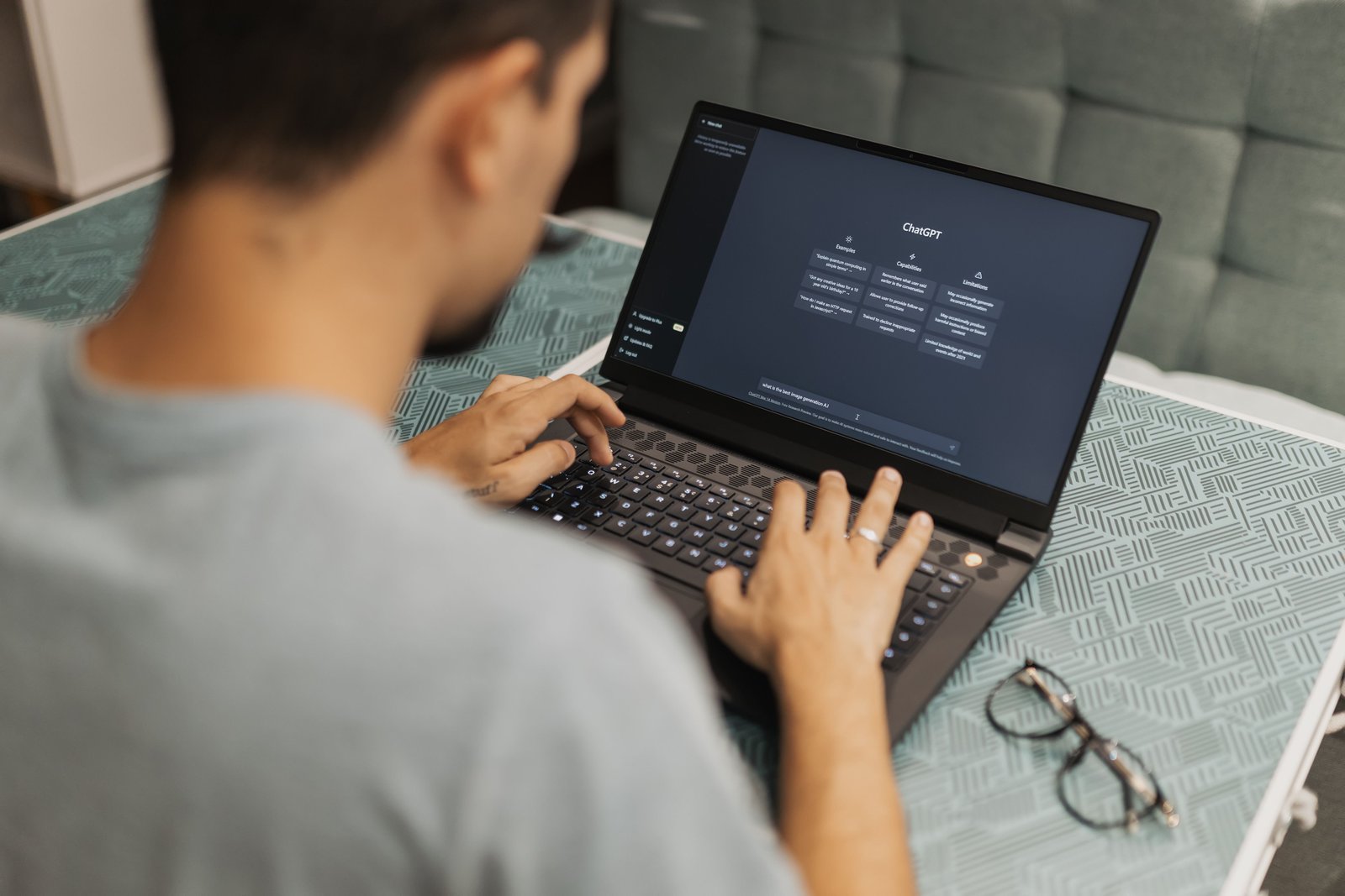 A man using ChatGPT for creating AI-assisted content.