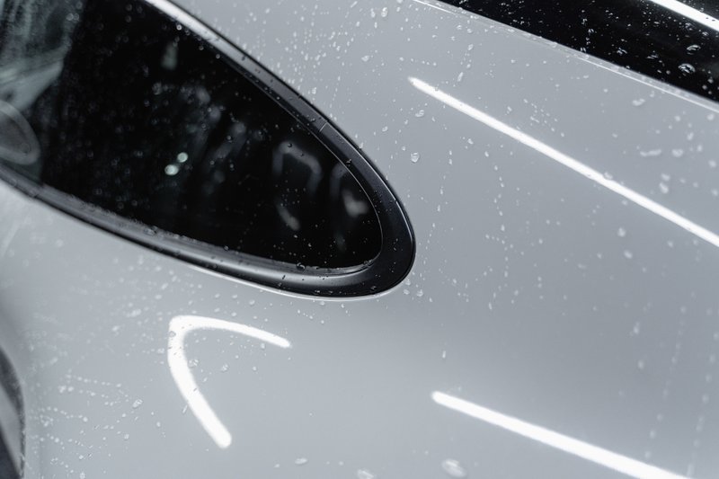 washing a car using self car wash equipment