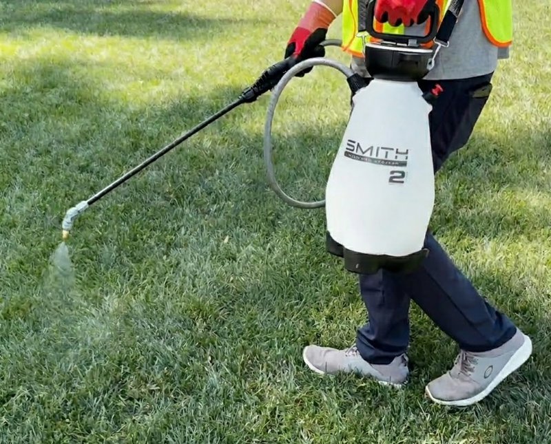 professional using smith performance sprayer