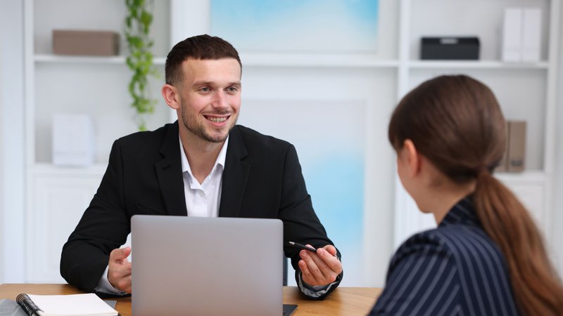 Business owner discussing financing options with a lending professional during a consultation.
