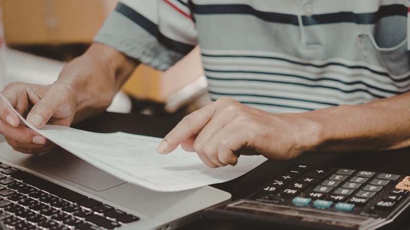 Business financing documents and financial records prepared for a lending review.