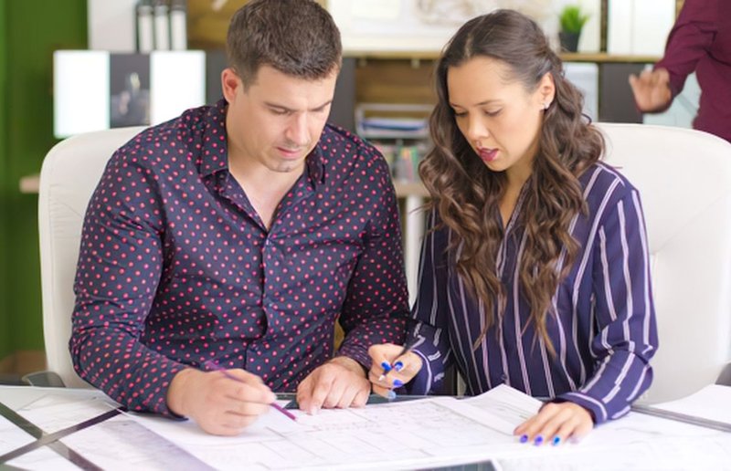 new building consulting services coordinators checking in new building permits and papers
