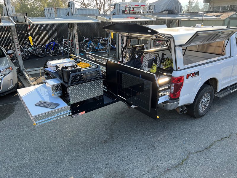 Fully extended Extendobed command unit with mounted display and organized equipment