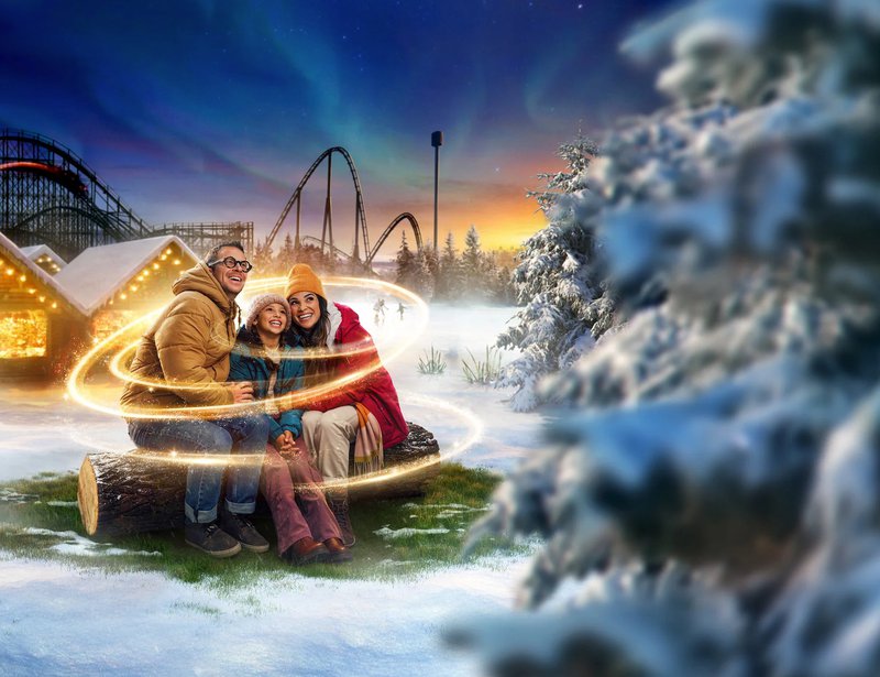 gezin in een winters landschap met rollercoasters
