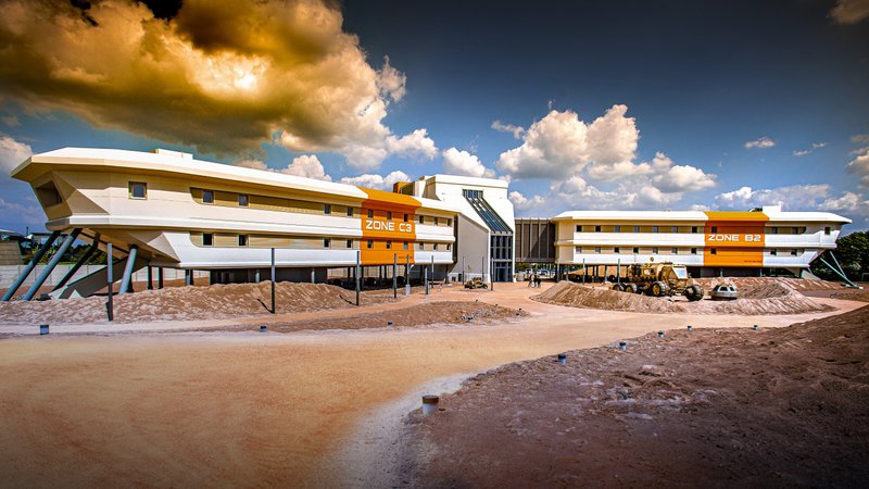 Hôtel ultramoderne dans un paysage inspiré de Mars.